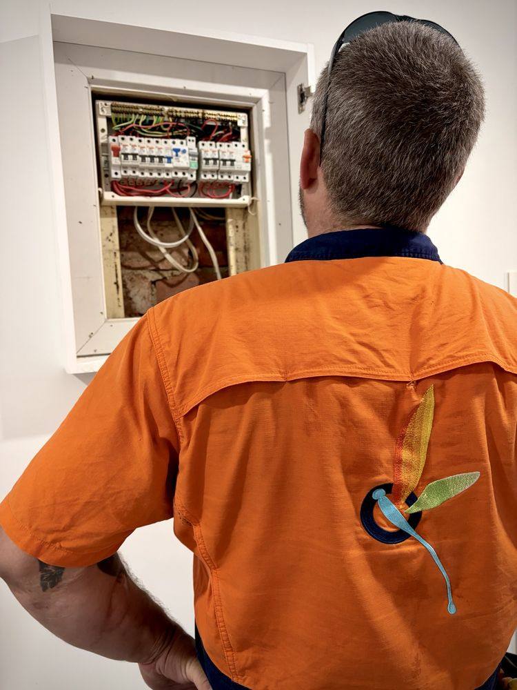 Haylo Energy electrician at a switchboard
